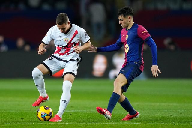 西甲联赛中,巴塞罗那队连续取胜 西甲联赛中,巴塞罗那队连续取胜