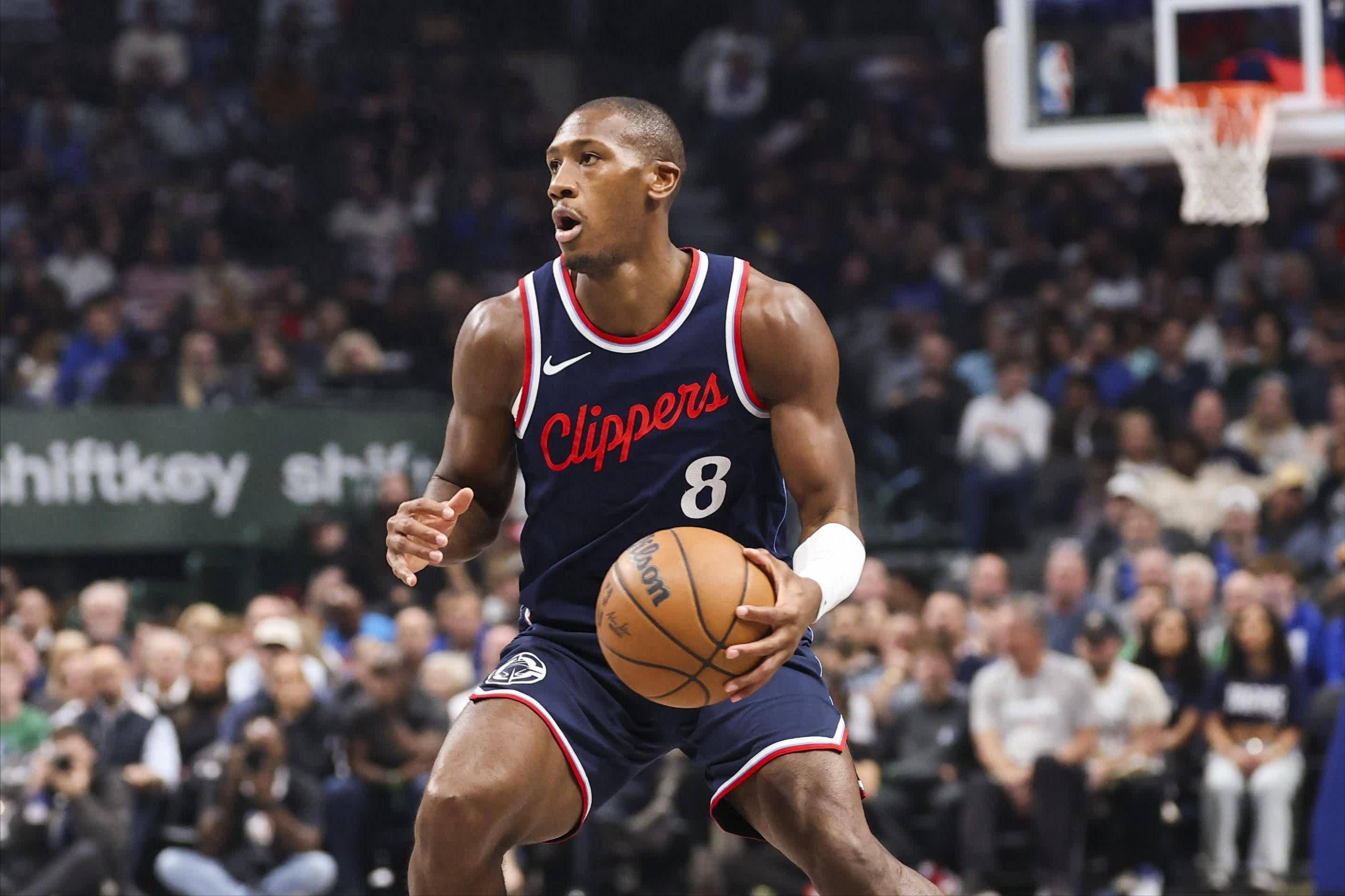 半岛体育网站入口-快船惊险胜开拓者，取得十一连胜